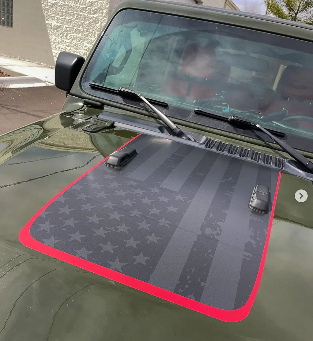 Jeep Gladiator hood decal featuring a subtle American flag design with a bold red border.